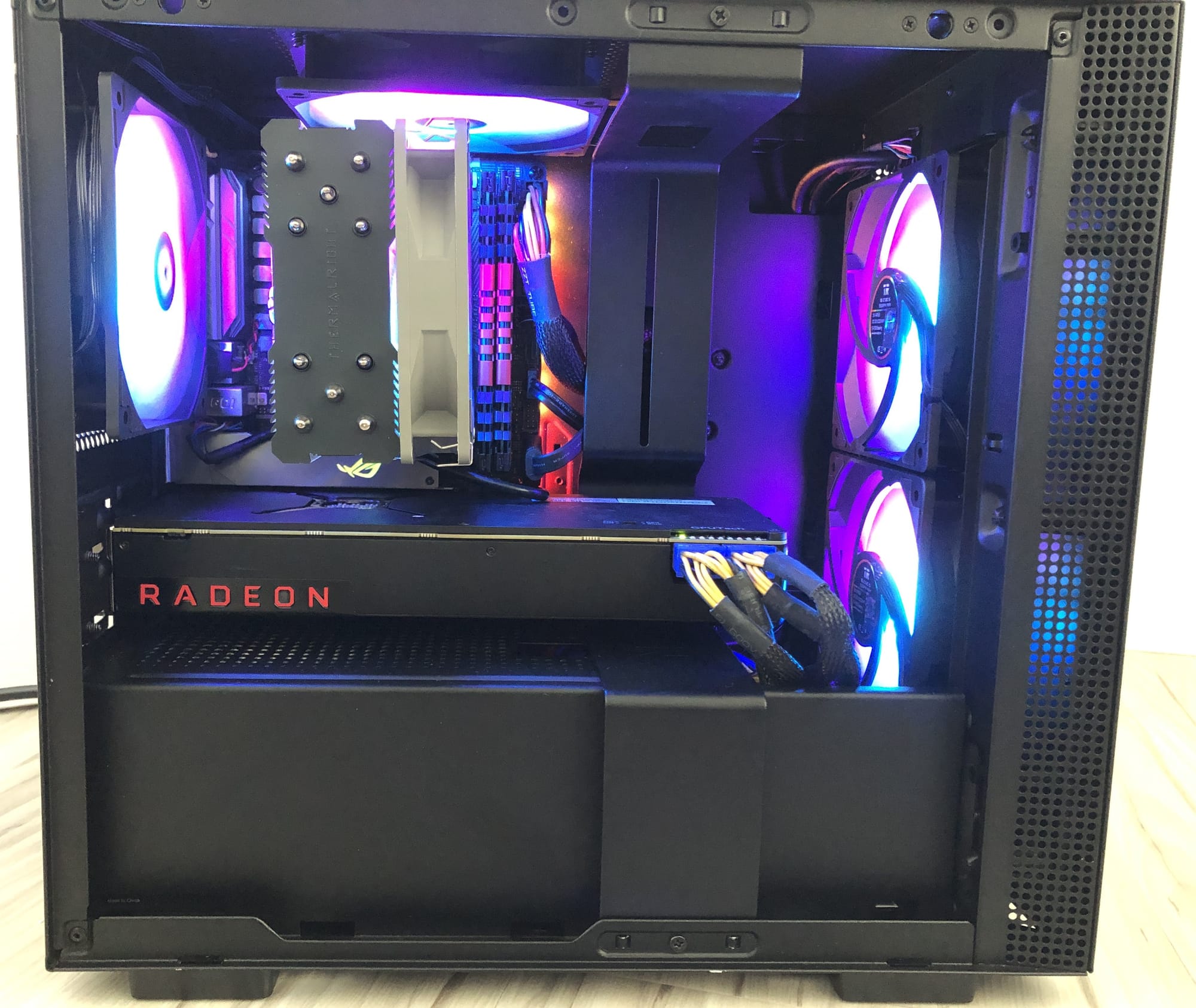 Internal view of ITX Gaming PC with a Ryzen 5 3600X CPU, ROG STRIX B350-I GAMING motherboard, AMD Radeon RX Vega 56, and ARGB fans inside an NZXT H210 case