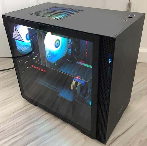 ITX Gaming PC with a Ryzen 5 3600X CPU, AMD Radeon RX Vega 56, and ARGB fans inside an NZXT H210 case